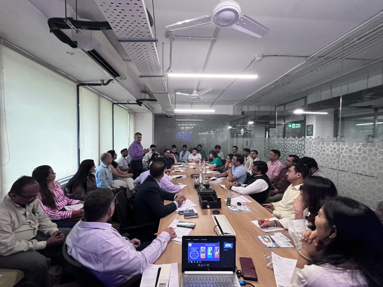 Kotnala team knowledge-sharing during delivery planning.